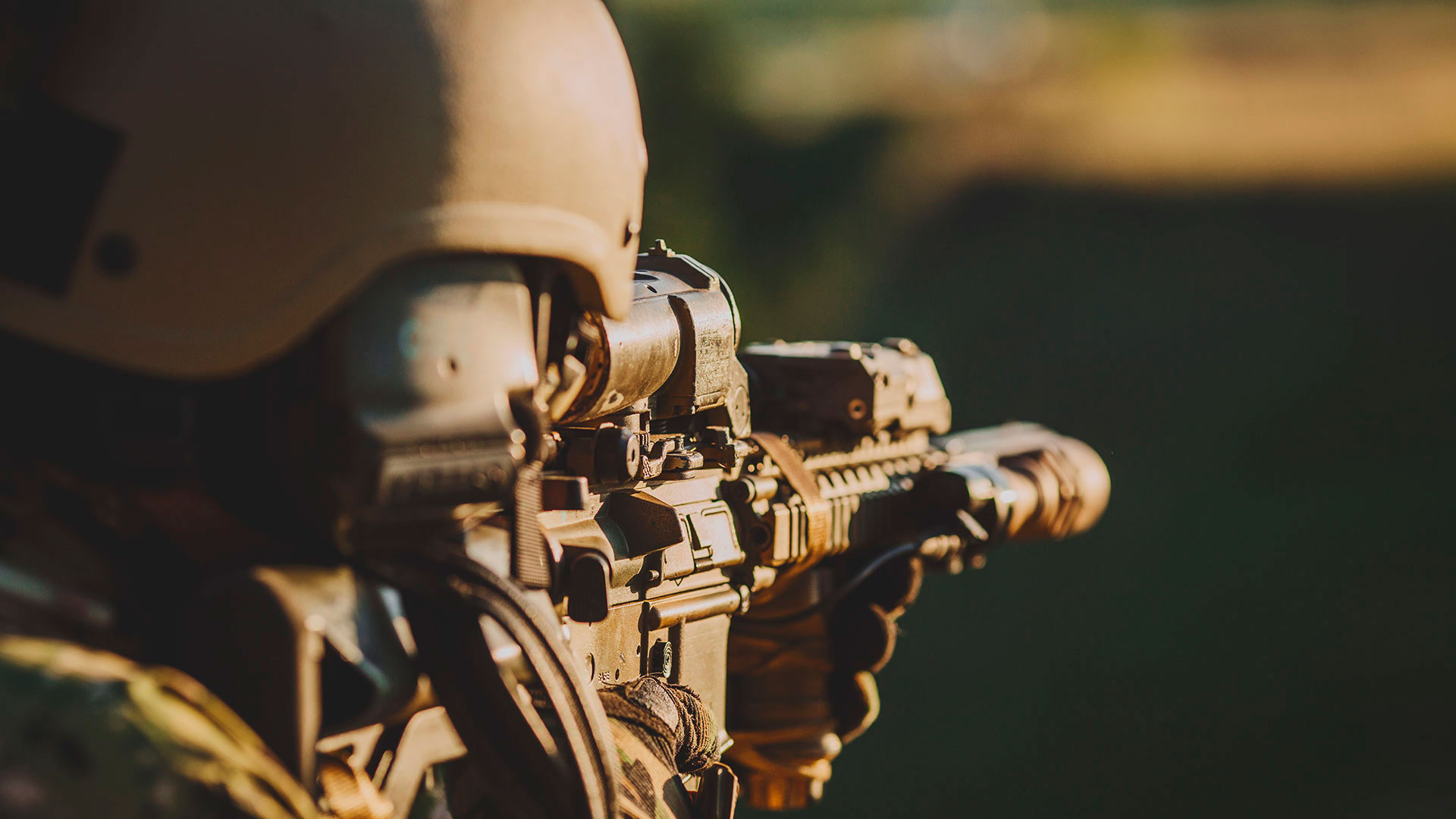 The back view of a Sniper about to take a shot